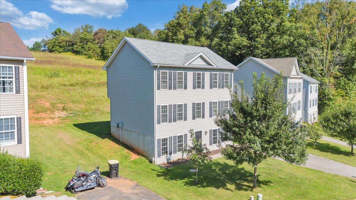 416 Old Fort Road Rocky Mount, VA 24151 - Photo 2 of 28 a aerial view of a house with a yard