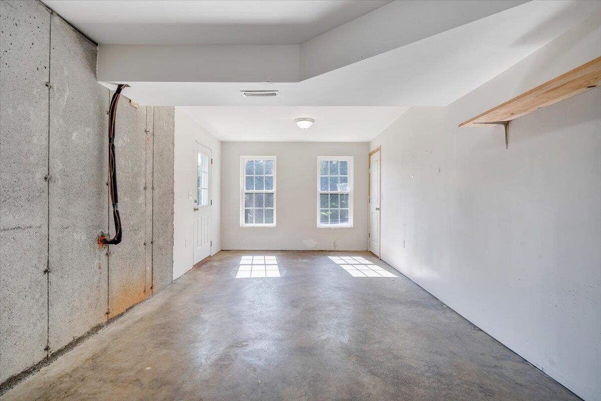 416 Old Fort Road Rocky Mount, VA 24151 - Photo 22 of 28 a view of a big room with wooden floor and windows