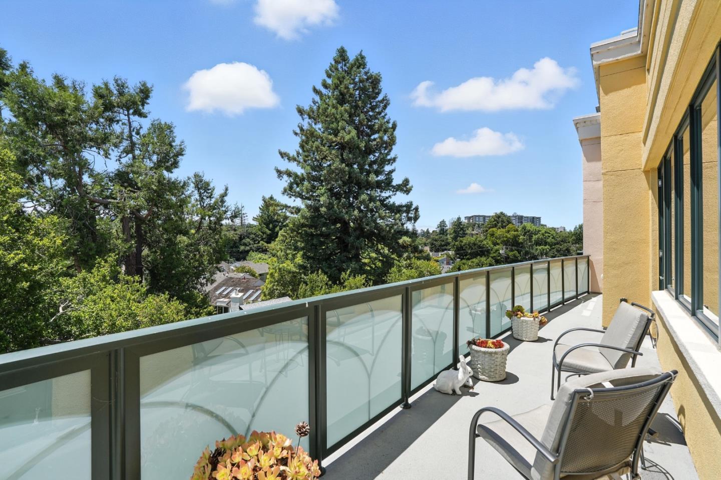 10 Crystal Springs Road, Unit 1507 San Mateo, CA 94402 - Photo 23 of 33 a view of a balcony with chair and wooden floor