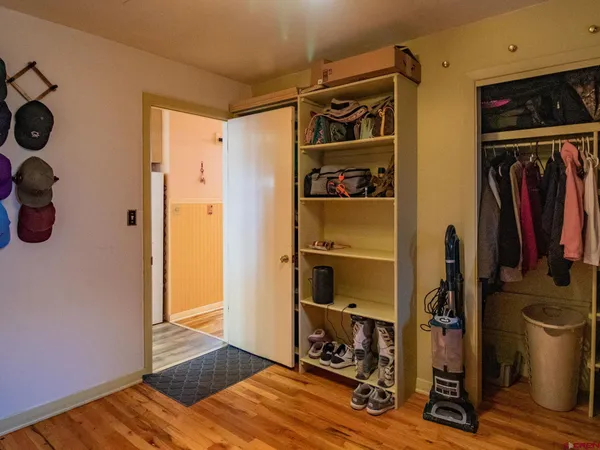 a bathroom with a shower toilet and sink