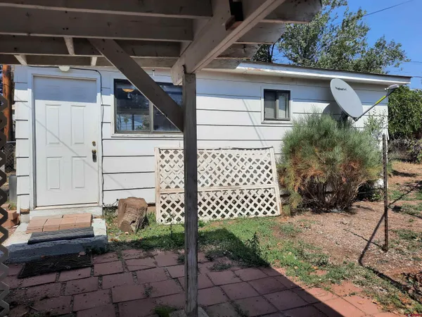 a view of a backyard with plants