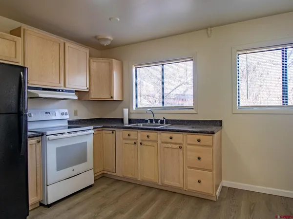 a view of a car in front of house