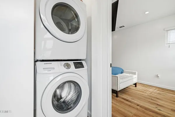 a view of a storage & utility room with washer and dryer