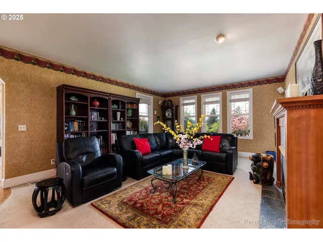 a living room with furniture toys and a flat screen tv