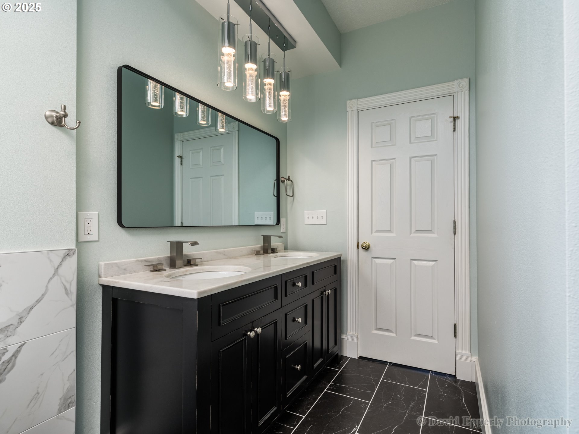 60750 Robinette Road St. Helens, OR 97051 - Photo 21 of 46 a bathroom with a sink and a mirror