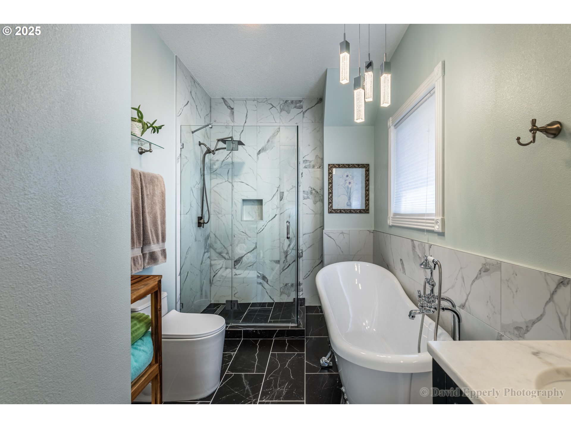 60750 Robinette Road St. Helens, OR 97051 - Photo 22 of 46 a bathroom with a sink a toilet and shower