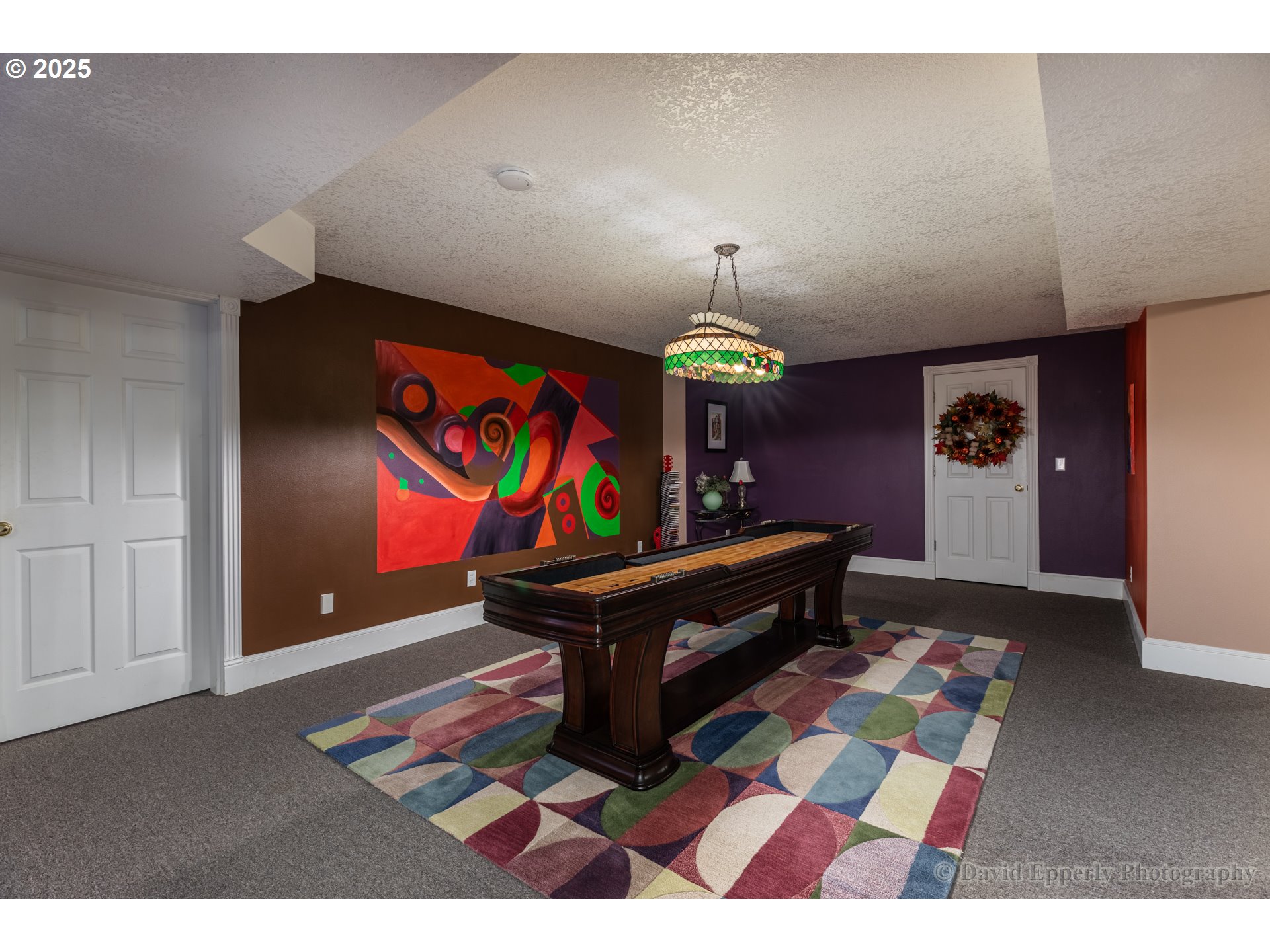 60750 Robinette Road St. Helens, OR 97051 - Photo 26 of 46 a living room with furniture and painting on the wall