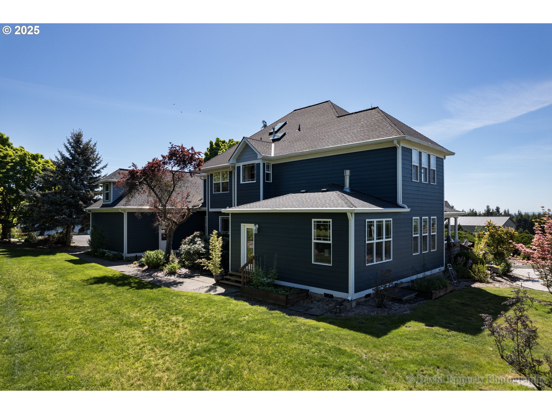 60750 Robinette Road St. Helens, OR 97051 - Photo 32 of 46 a view of a house with a yard