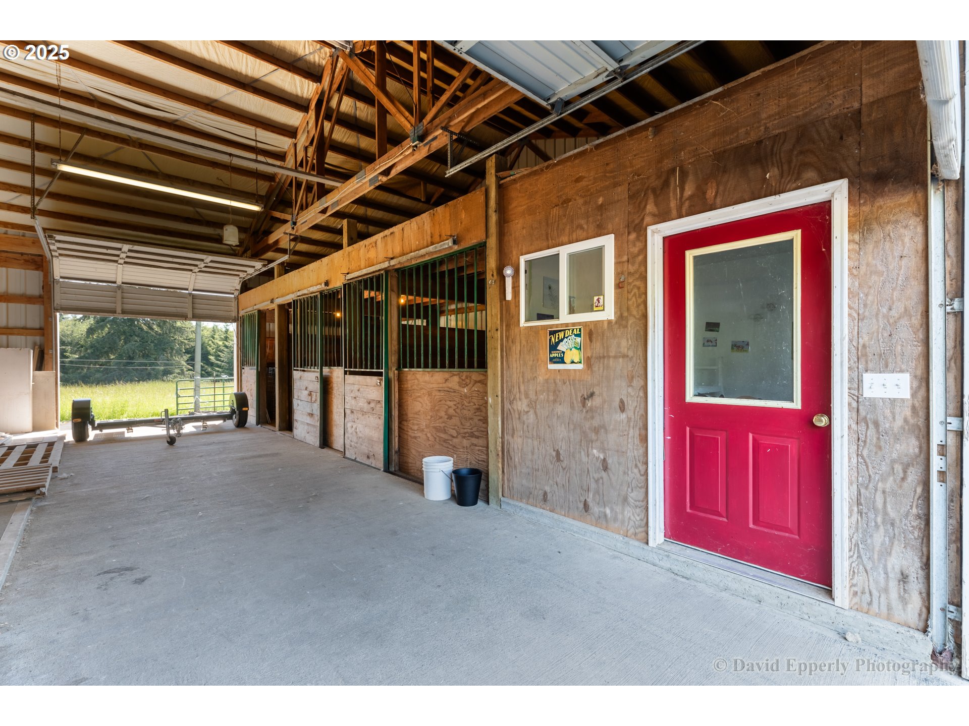 60750 Robinette Road St. Helens, OR 97051 - Photo 36 of 46 a view of a room with wooden floor and windows