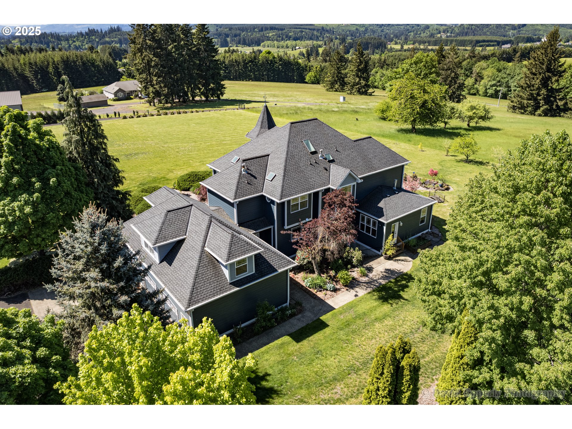 60750 Robinette Road St. Helens, OR 97051 - Photo 41 of 46 an aerial view of a house with outdoor space swimming pool and mountains