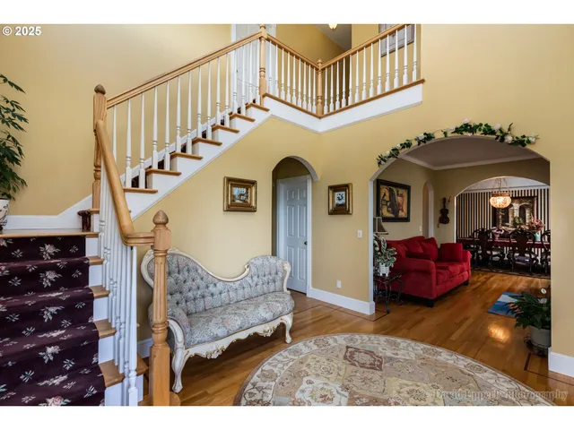 a view of entryway livingroom and hall