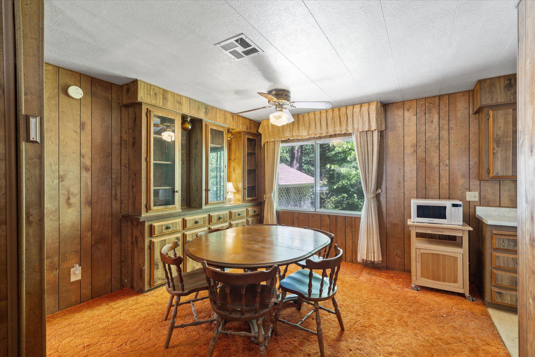 30588 Shingletown Ridge Road Shingletown, CA 96088 - Photo 11 of 44 a dining room with furniture and window