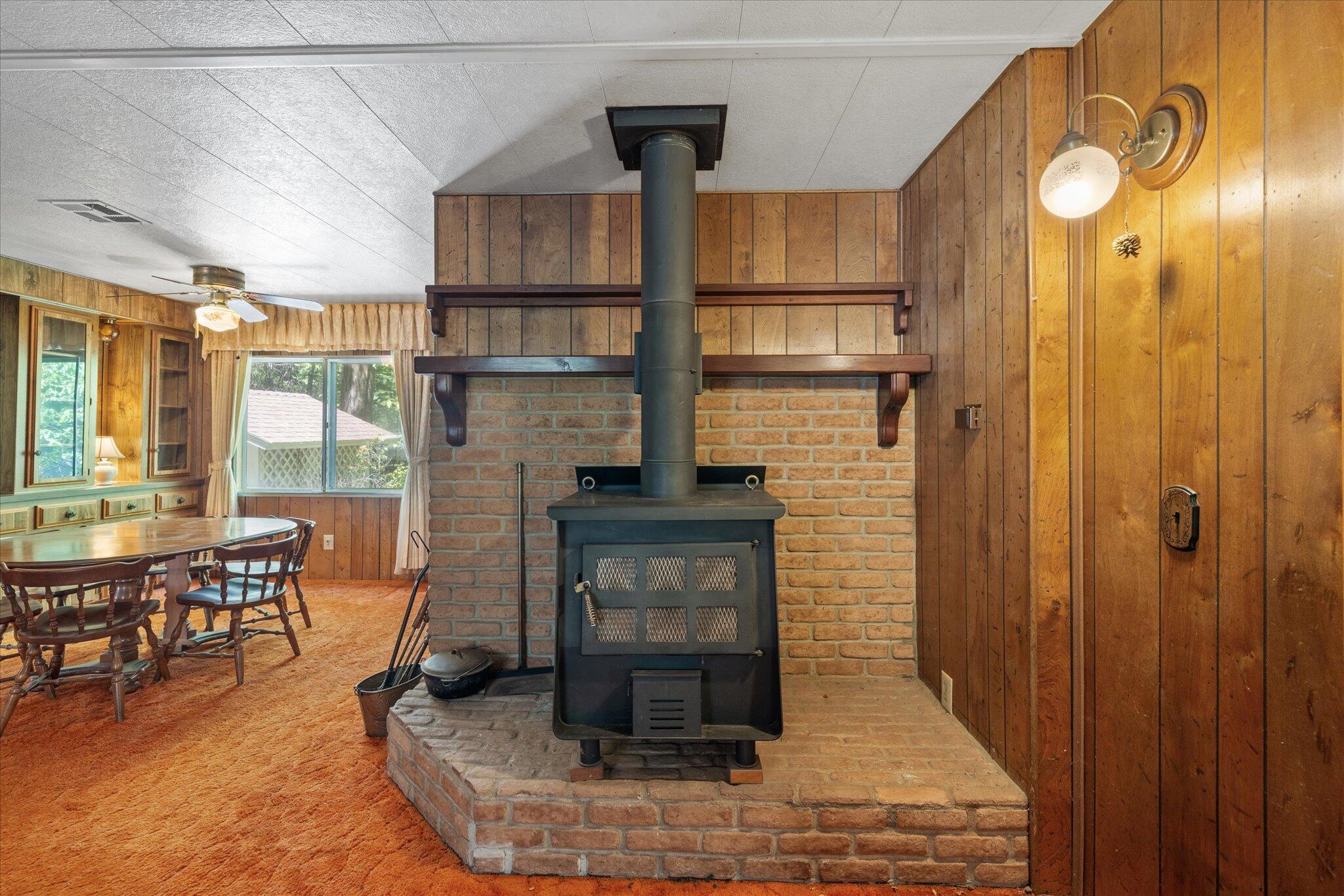 30588 Shingletown Ridge Road Shingletown, CA 96088 - Photo 13 of 44 a living room with fireplace