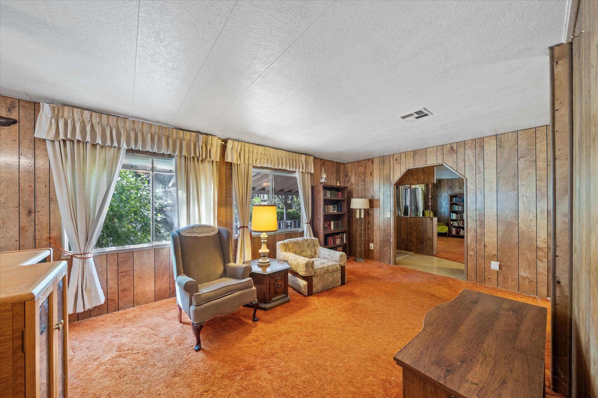 30588 Shingletown Ridge Road Shingletown, CA 96088 - Photo 17 of 44 a living room with furniture and a large window