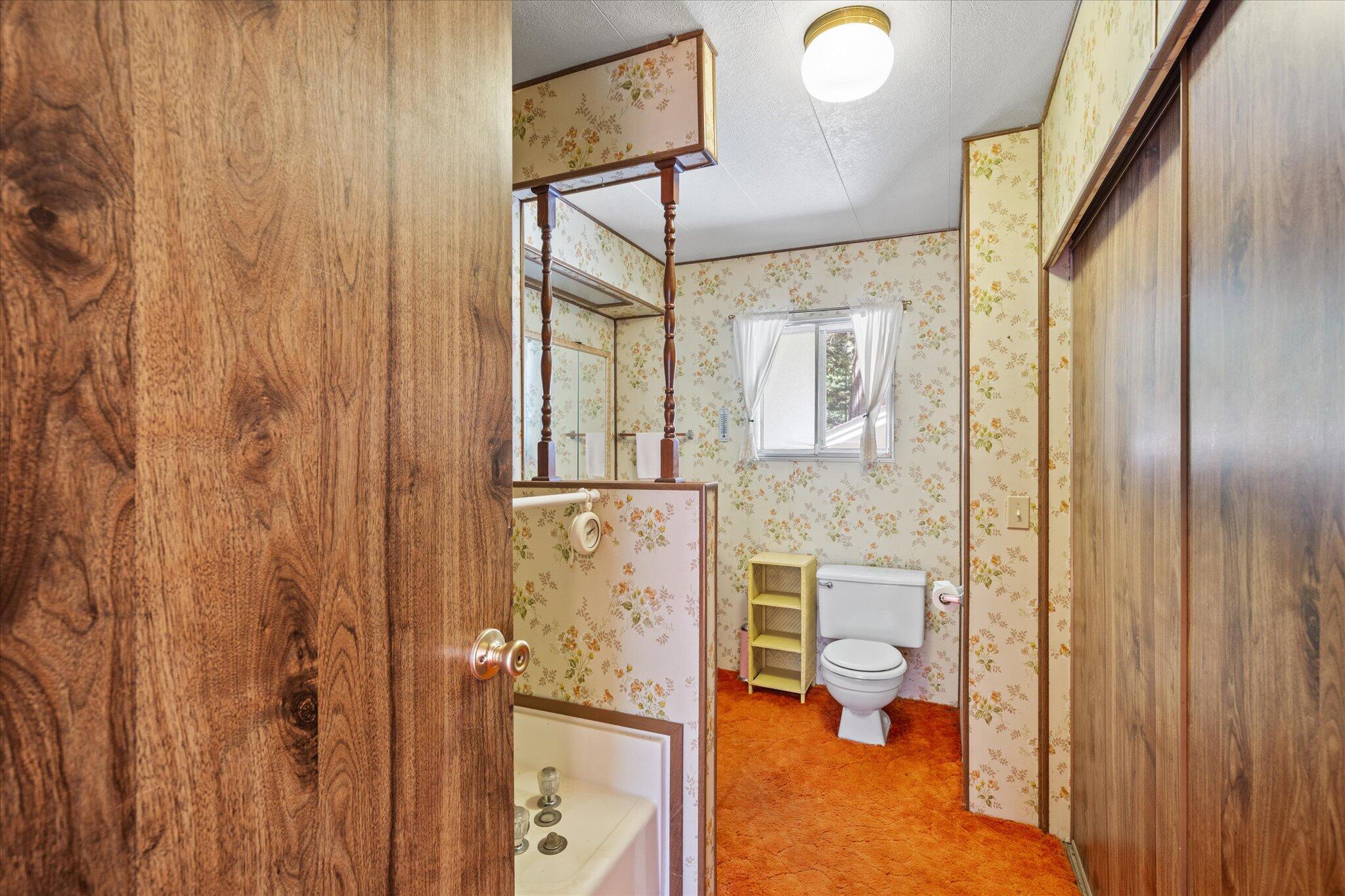 30588 Shingletown Ridge Road Shingletown, CA 96088 - Photo 19 of 44 a bathroom with a toilet and a shower