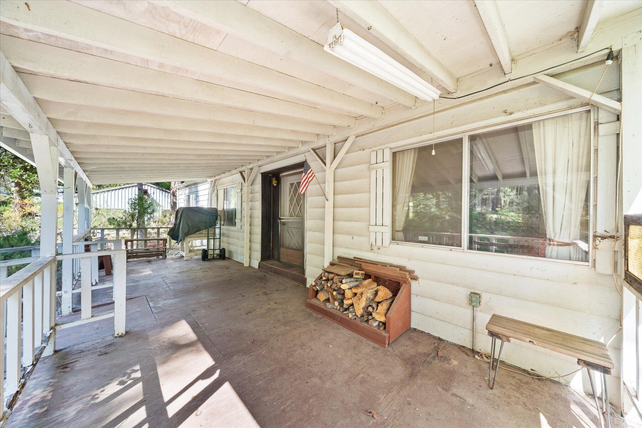 30588 Shingletown Ridge Road Shingletown, CA 96088 - Photo 32 of 44 a living room with furniture and a large window