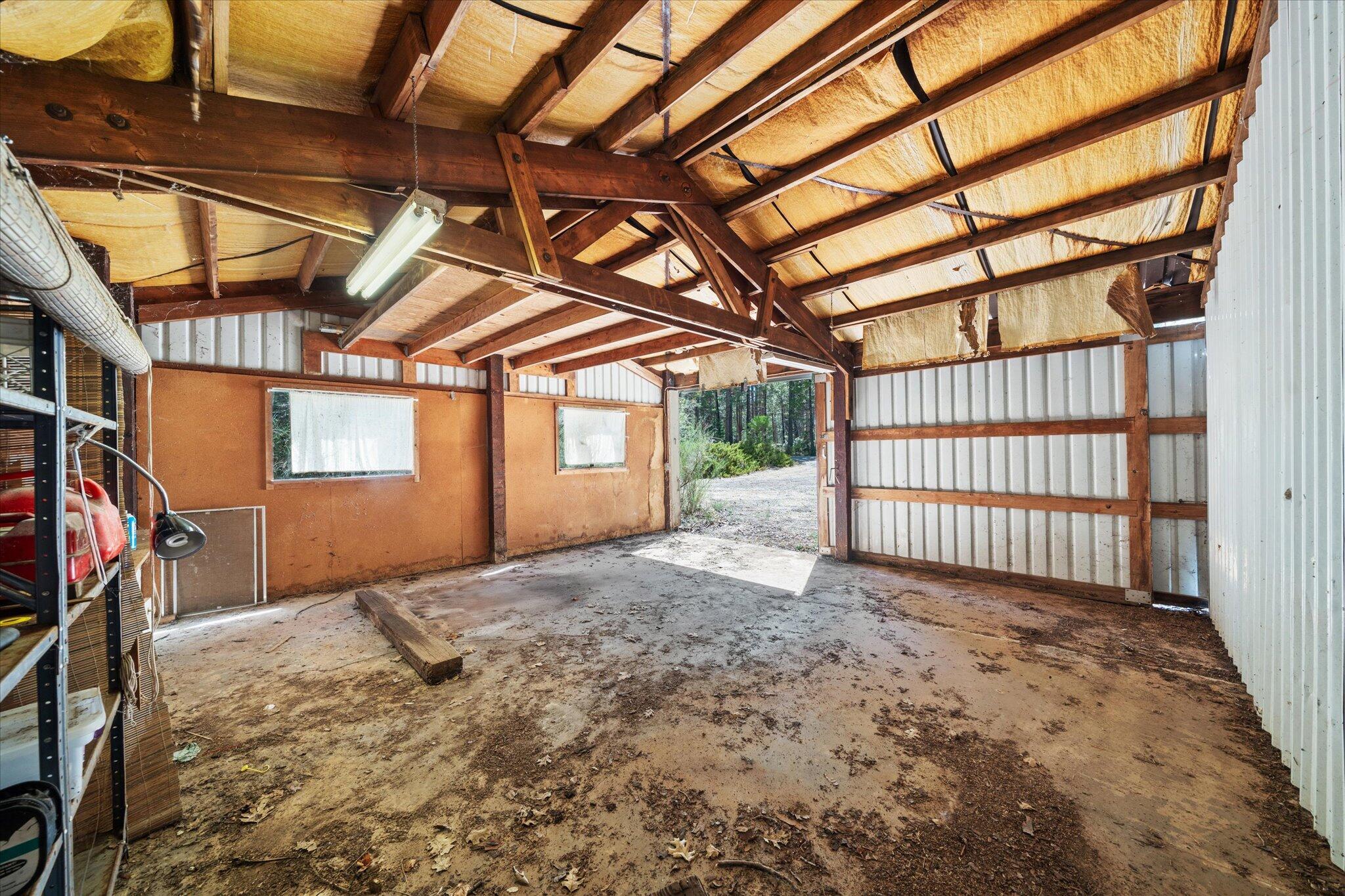 30588 Shingletown Ridge Road Shingletown, CA 96088 - Photo 35 of 44 a view of a room with wooden walls