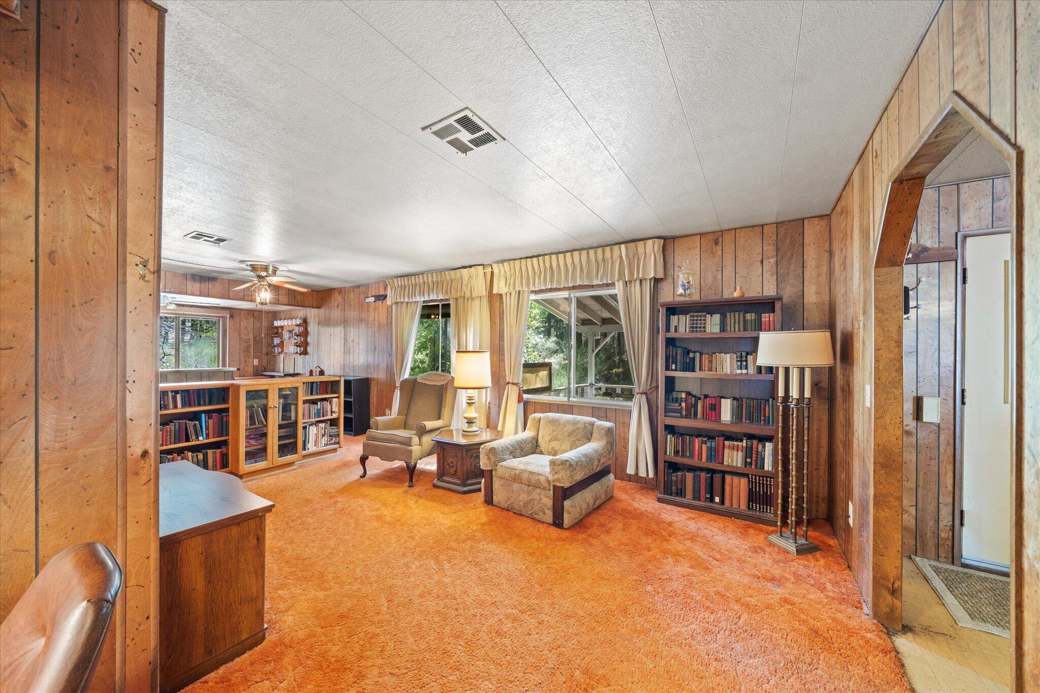 30588 Shingletown Ridge Road Shingletown, CA 96088 - Photo 7 of 44 a living room with lots of furniture and a large window