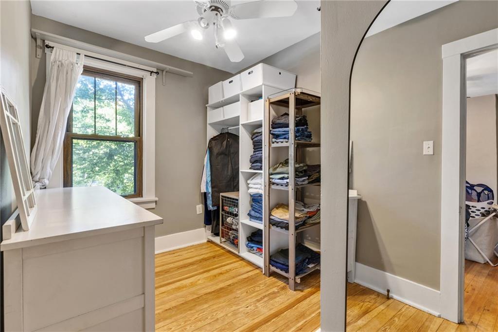 9615 Harding Road Pittsburgh, PA 15237 - Photo 17 of 25 walk in closet with window and chandelier