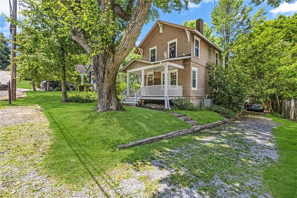 9615 Harding Road Pittsburgh, PA 15237 - Photo 3 of 25 a front view of a house with a yard