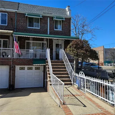 a view of a house with iron stairs