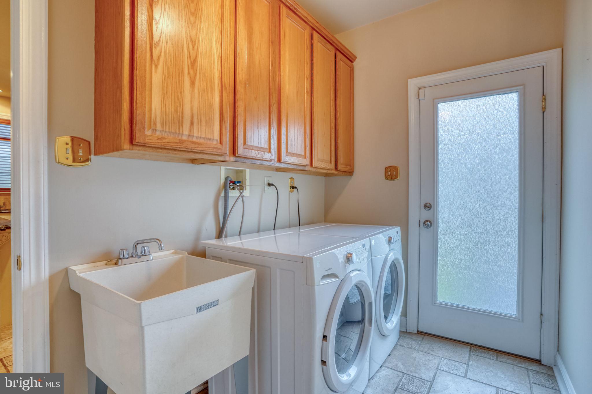 357 Willits Way Garnet Valley, PA 19060 - Photo 30 of 63 a utility room with dryer and washer