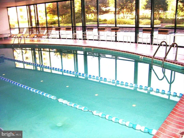 a view of yard with swimming pool
