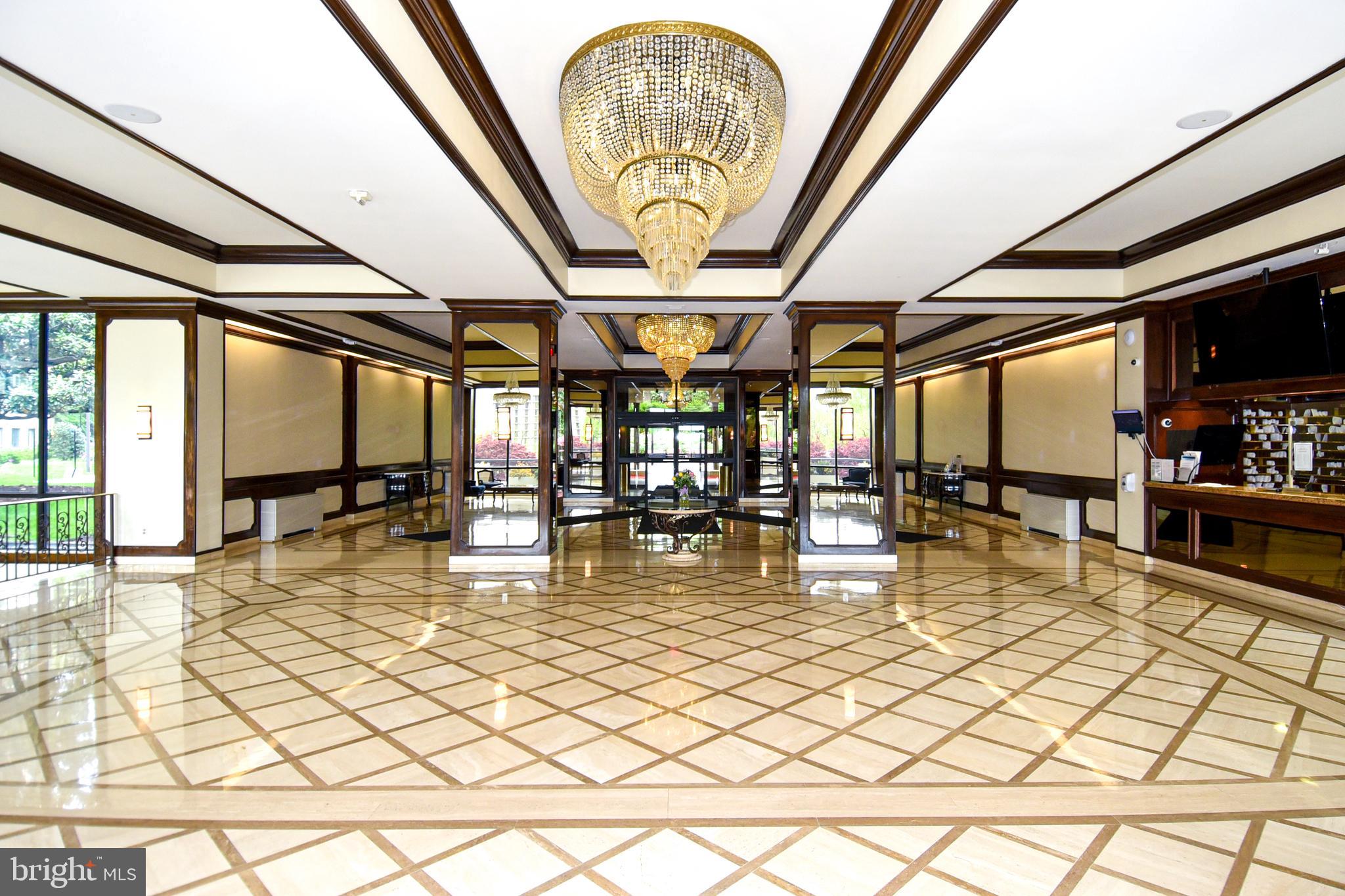 5225 Pooks Hill Road, Unit 803N Bethesda, MD 20814 - Photo 27 of 43 a swimming pool with a outdoor seating and a lots of water view