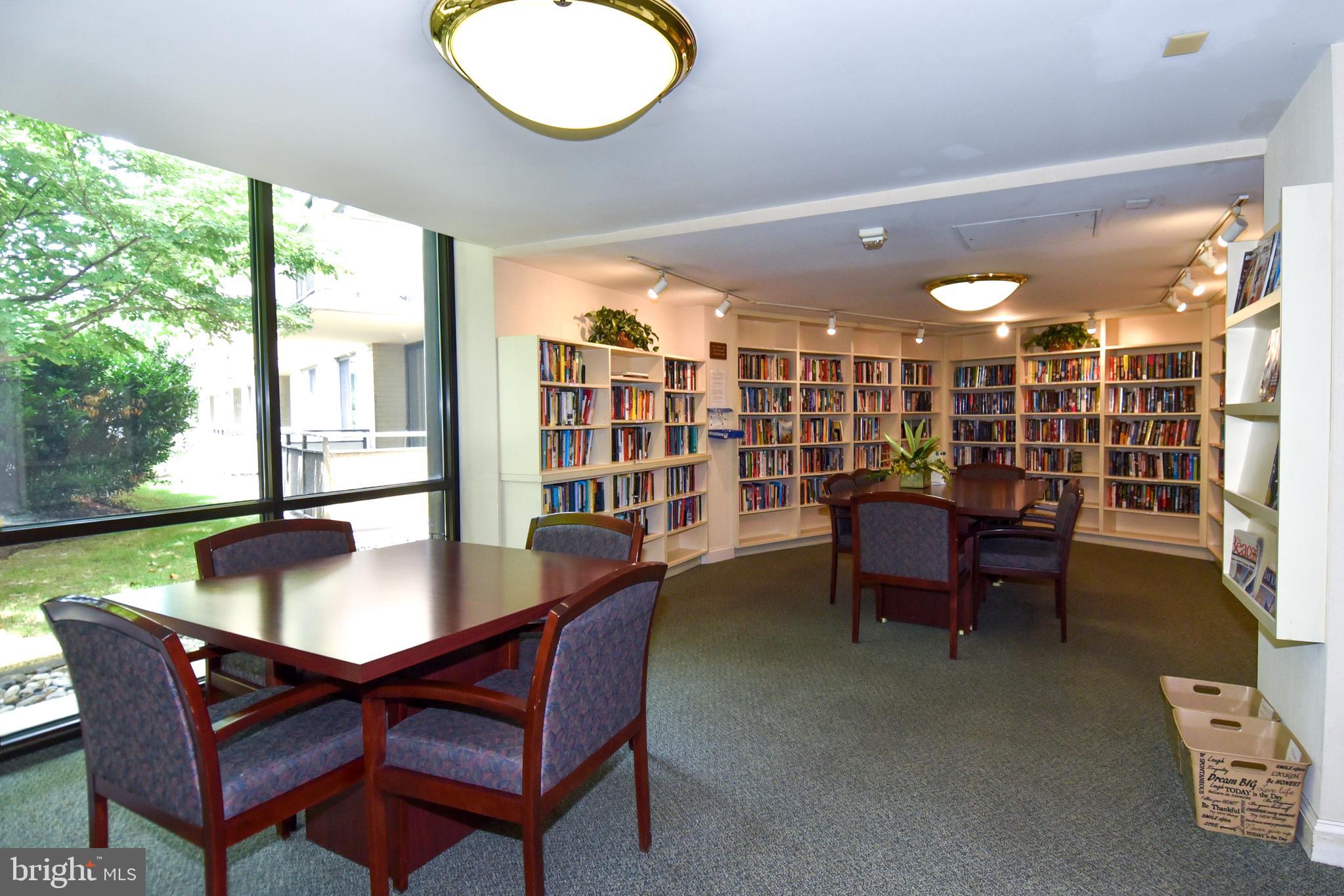 5225 Pooks Hill Road, Unit 803N Bethesda, MD 20814 - Photo 33 of 43 a dining room with furniture and a floor to ceiling window