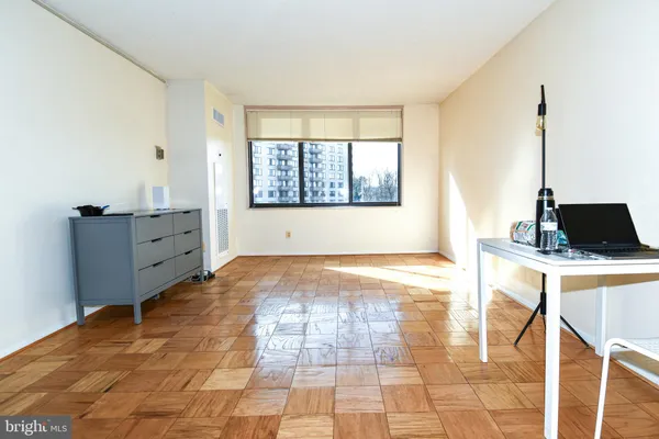 a view of an empty room and window