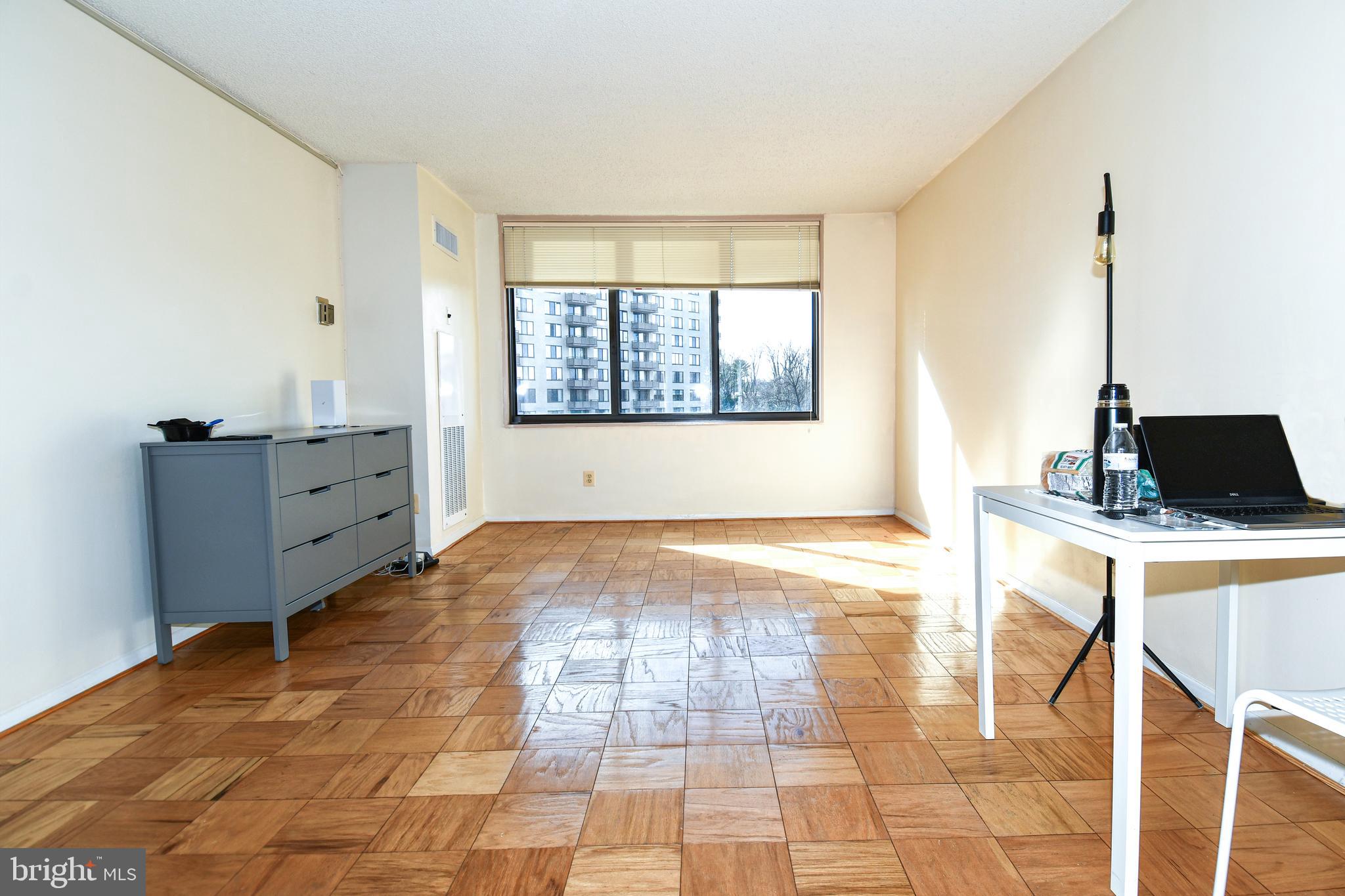 5225 Pooks Hill Road, Unit 803N Bethesda, MD 20814 - Photo 6 of 43 a view of an empty room and window
