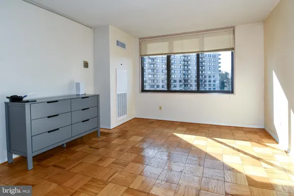 a view of an empty room and window