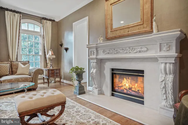 a spacious bedroom with a bed and a large window