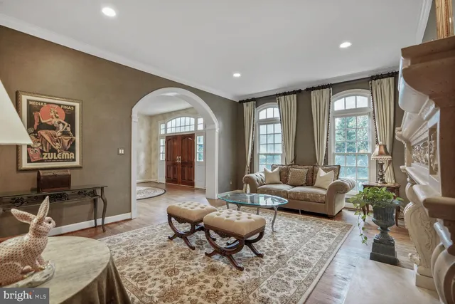 a bedroom with a large bed and a large window