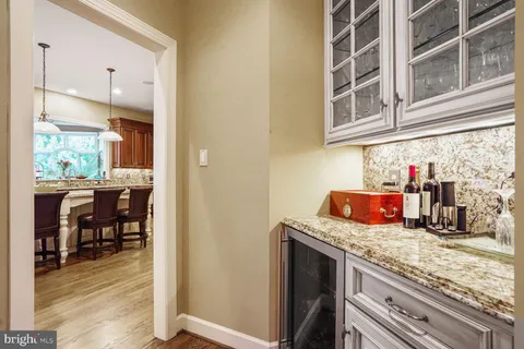a bedroom with a large bed and a balcony view