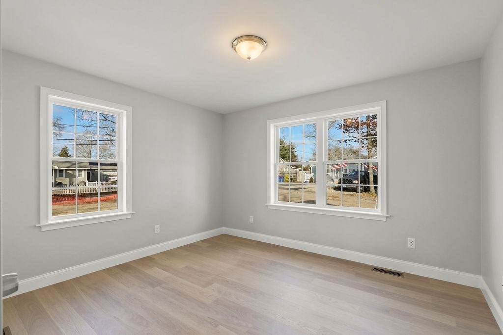 81 Maple Springs Road Wareham, MA 02571 - Photo 10 of 17 an empty room with windows