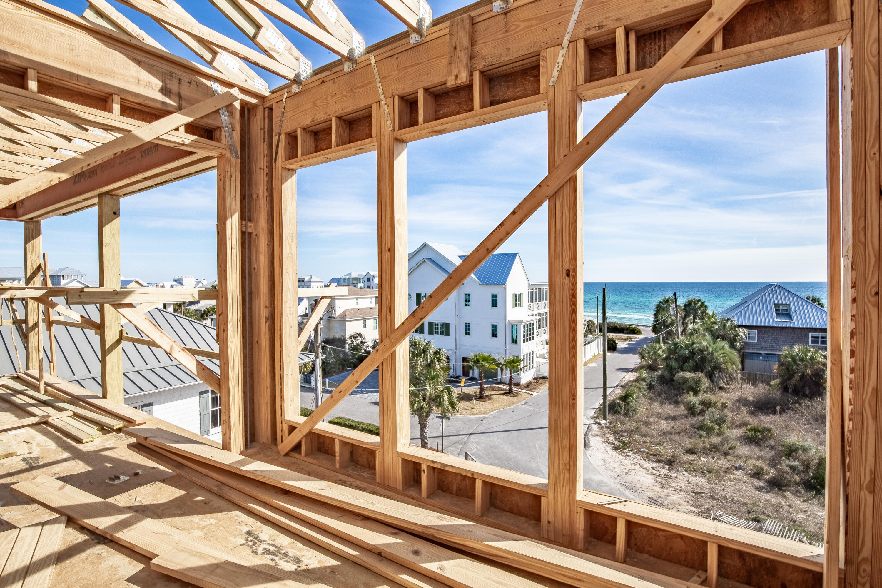 329 Winston Ln Inlet Beach Inlet Beach, FL 32461 - Photo 7 of 11 a view of a balcony with wooden floor and iron stairs
