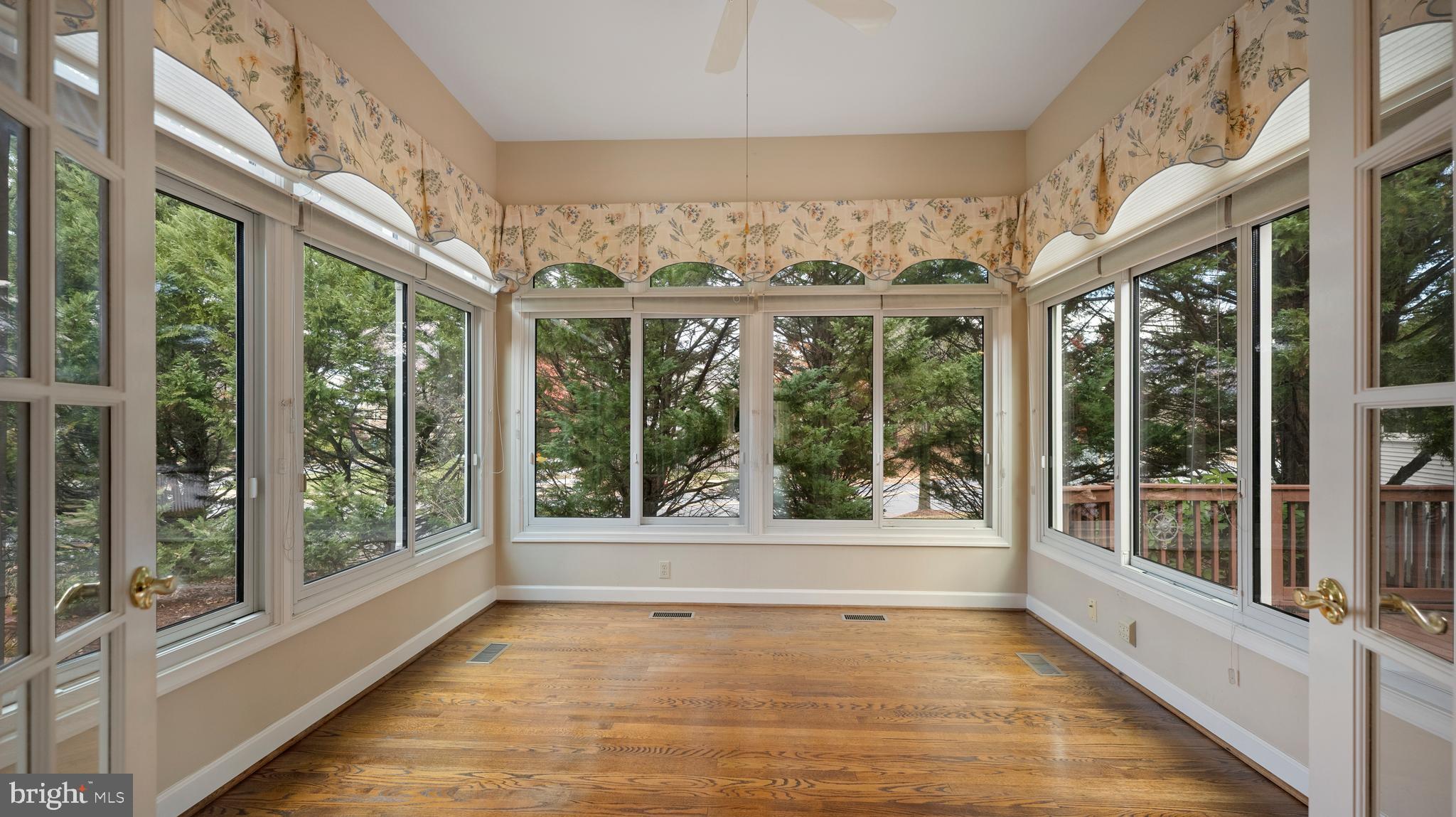 2355 Bear Den Road Frederick, MD 21701 - Photo 20 of 65 sunroom/family room - hardwood floors