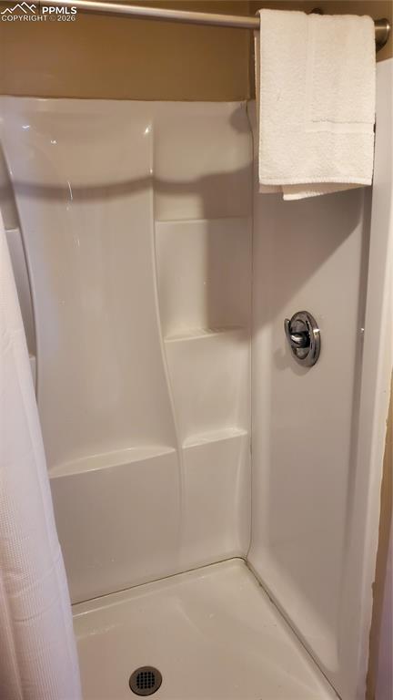 400 Victor Avenue Victor, CO 80860 - Photo 24 of 36 a close up of a bathtub