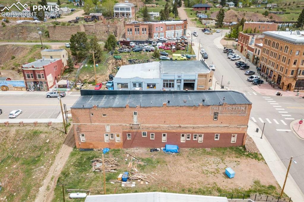400 Victor Avenue Victor, CO 80860 - Photo 4 of 36 an aerial view of a house with a yard