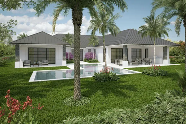 a view of a house with a backyard and a tree