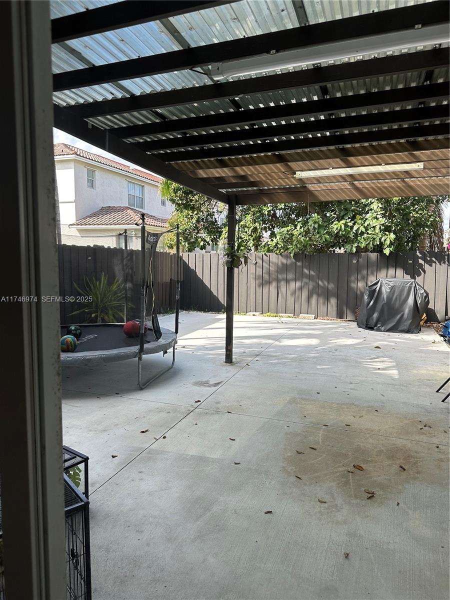 11031 Southwest 246th Street Homestead, FL 33032 - Photo 14 of 25 a view of a patio