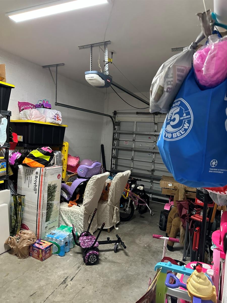 11031 Southwest 246th Street Homestead, FL 33032 - Photo 25 of 25 a storage room with lots of clutter and bicycles