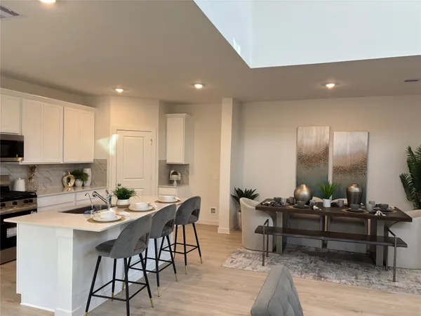 a bed room with a bed and a television