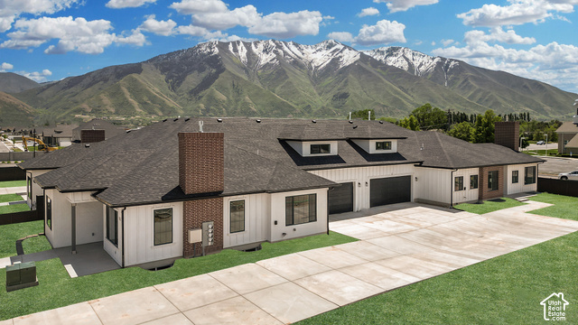 1631 West Century Lane, Unit B Mapleton, UT 84664 - Photo 23 of 23 Granite front - Slate Back -Modern home with a dark shingle roof and white vertical siding