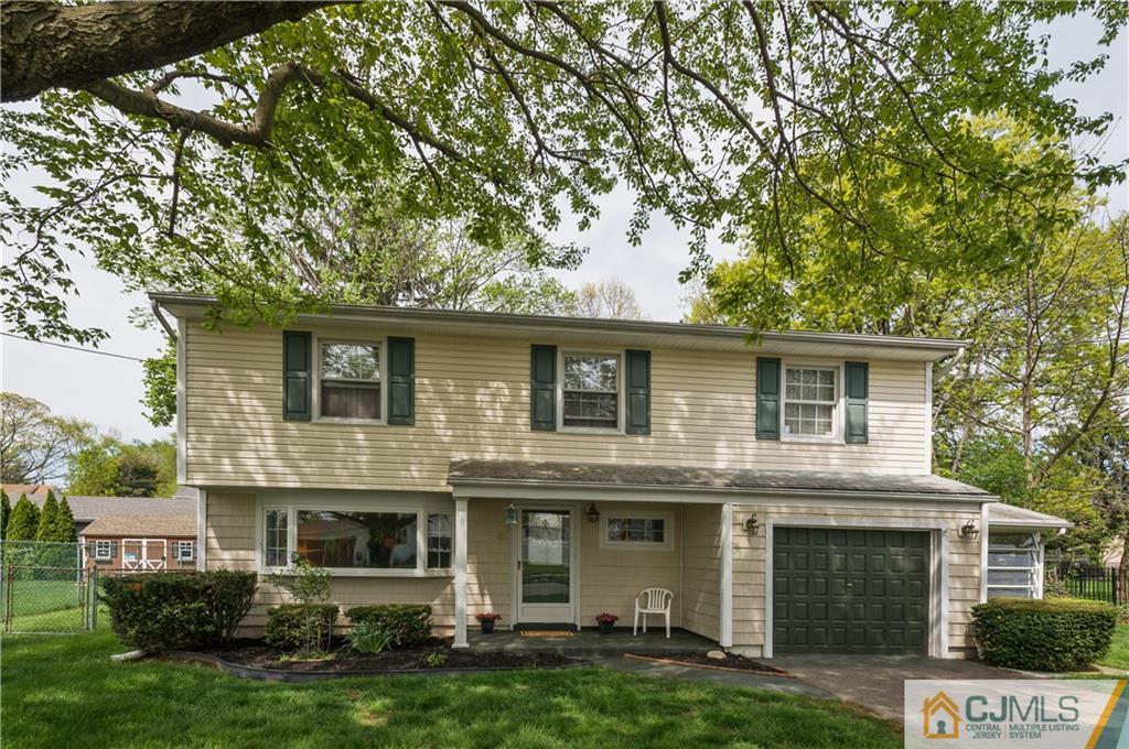 6 Paley Place Edison, NJ 08817 - Photo 1 of 18 front view of a house with a yard