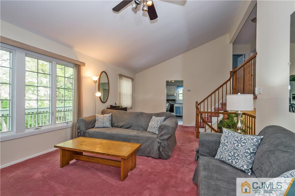 6 Paley Place Edison, NJ 08817 - Photo 5 of 18 a living room with furniture and a large window