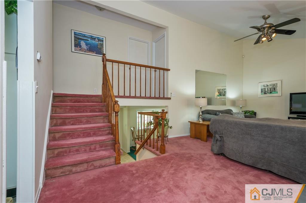 6 Paley Place Edison, NJ 08817 - Photo 6 of 18 a view of livingroom with furniture and staircase