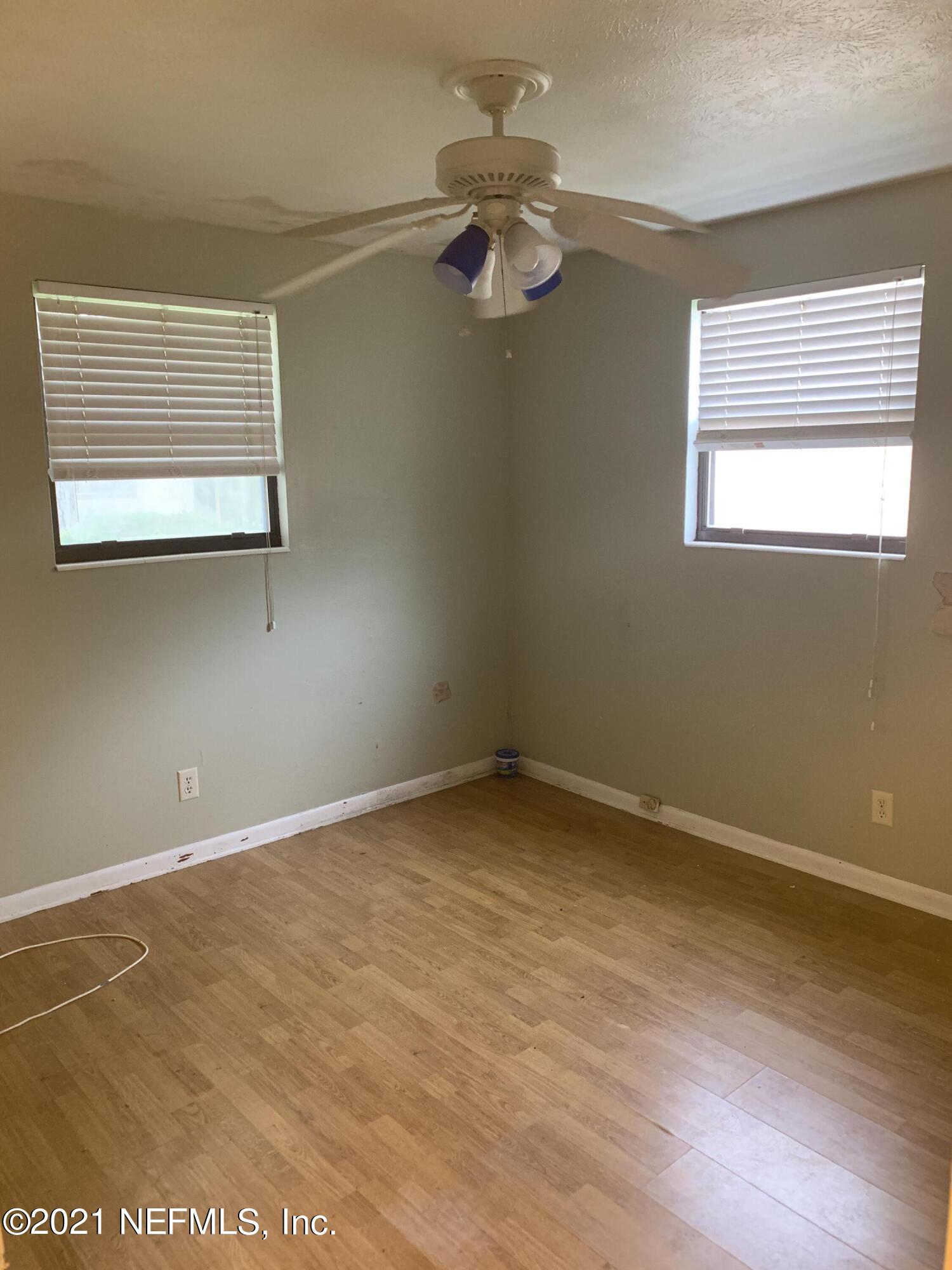 4126 Dayrl Road Jacksonville, FL 32207 - Photo 13 of 26 a view of an empty room with a window
