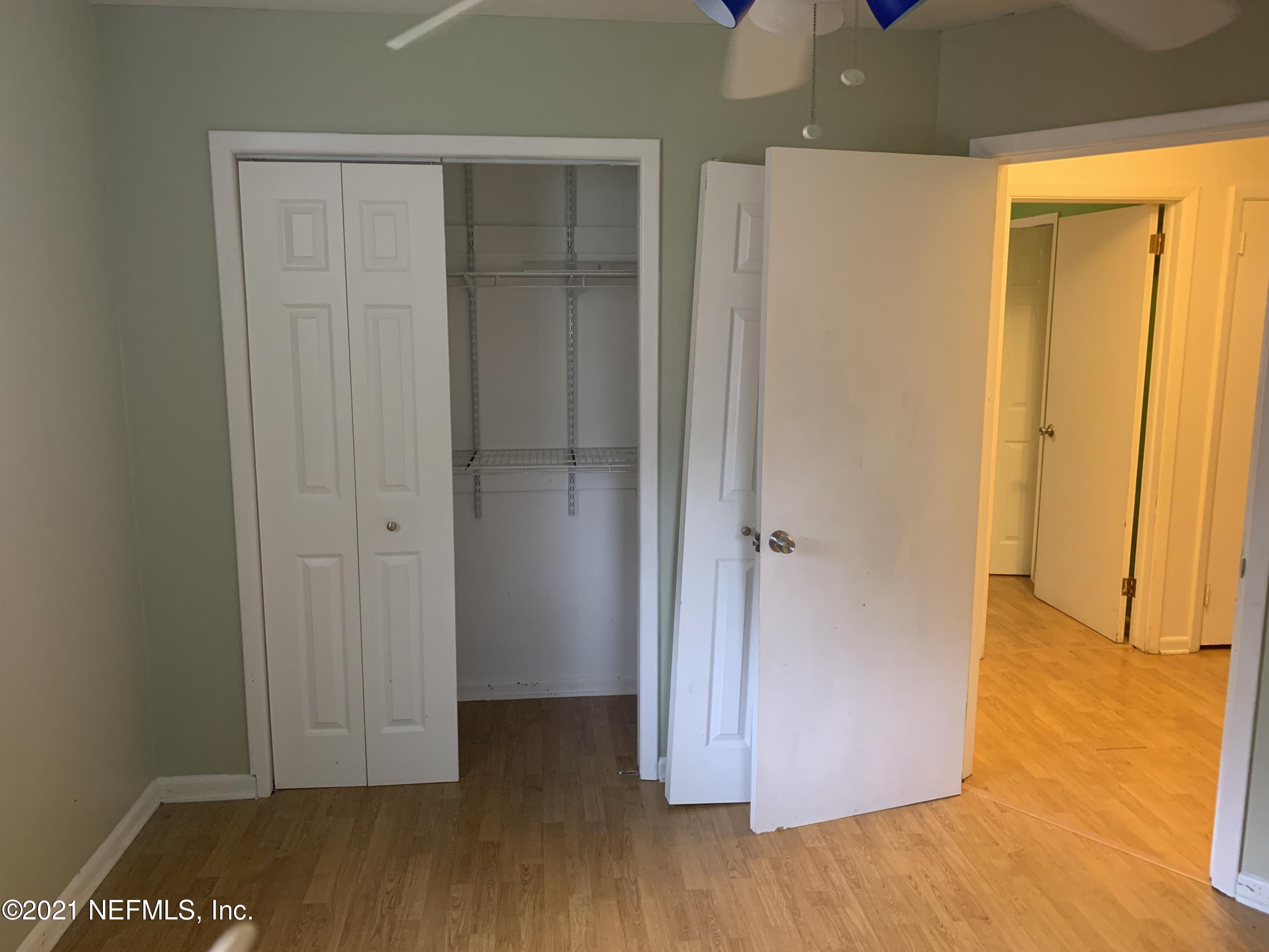 4126 Dayrl Road Jacksonville, FL 32207 - Photo 14 of 26 a view of a hallway with wooden floor